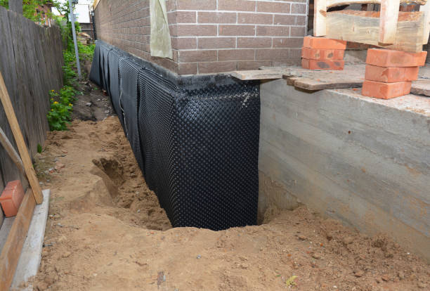 Happy homeowners after waterproofing job in Lenoir City